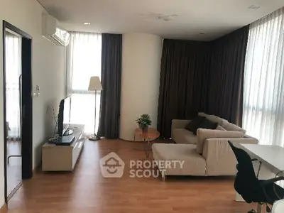 Spacious living room with modern furniture and natural light