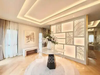 Luxurious modern living room with elegant lighting and stylish decor