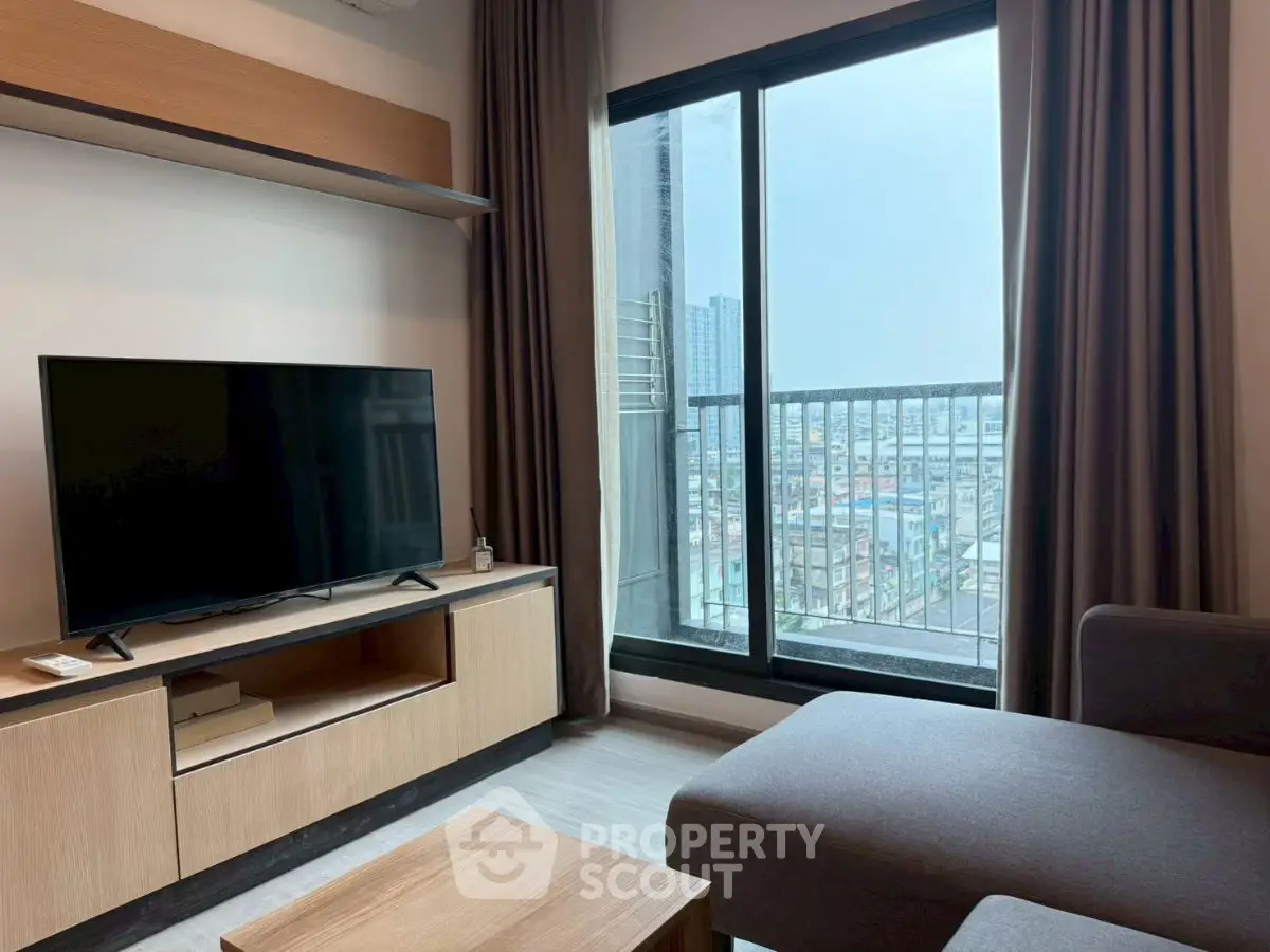 Modern living room with city view and sleek furniture