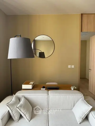 Modern living room with stylish decor and neutral tones