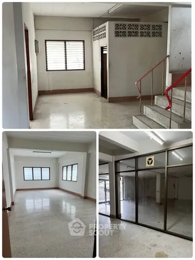 Spacious commercial property with large windows and open layout, ideal for office or retail space.