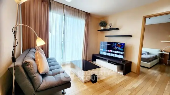 Modern living room with sleek furniture and natural light