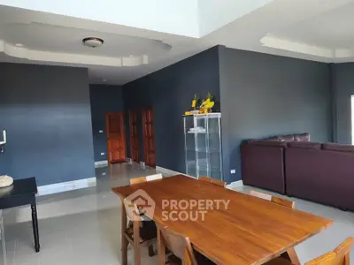 Spacious modern living room with elegant dining area and stylish furniture