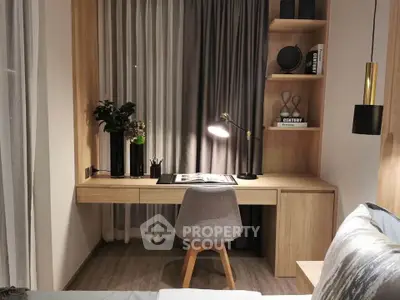 Modern study area with sleek wooden desk and stylish decor