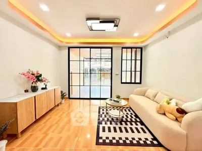 Modern living room with stylish lighting and cozy decor