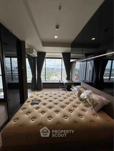 Luxurious bedroom with stunning city view and modern decor