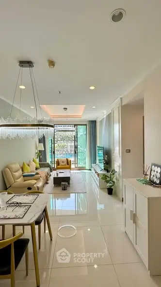 Modern living room with elegant decor and balcony view