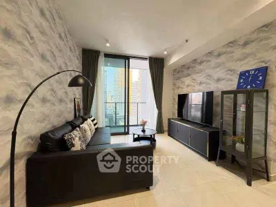 Modern living room with stylish decor and city view from large windows.