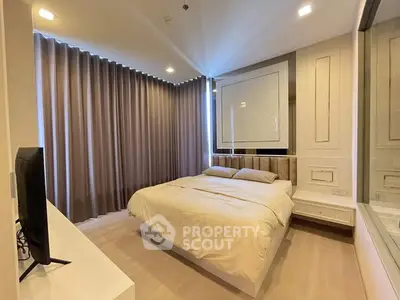 Modern bedroom with elegant decor and natural lighting