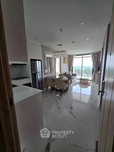 Luxurious open-plan living room with stunning view and elegant dining area