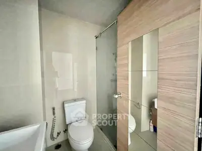 Modern bathroom with sleek design and glass shower enclosure