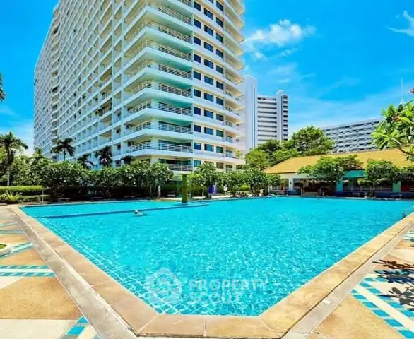 Luxurious high-rise building with a stunning outdoor pool and lush garden area.