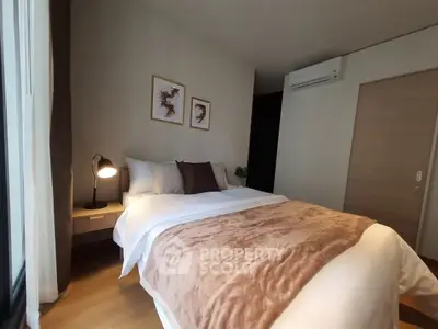 Cozy bedroom with modern decor and natural light