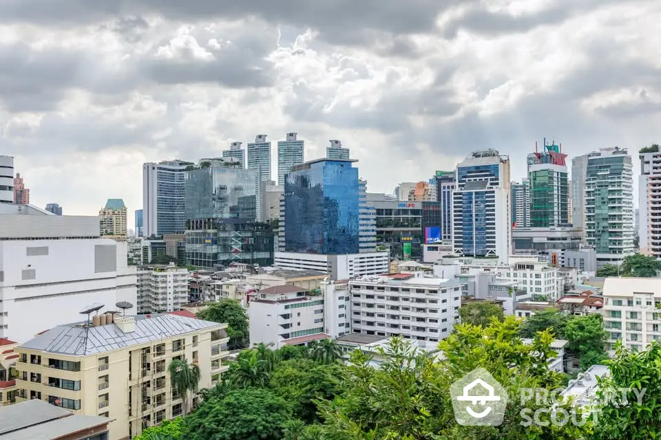 Stunning cityscape view showcasing modern skyscrapers and lush greenery, perfect for urban living enthusiasts.