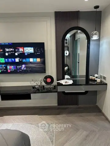 Modern living room with sleek entertainment setup and stylish decor