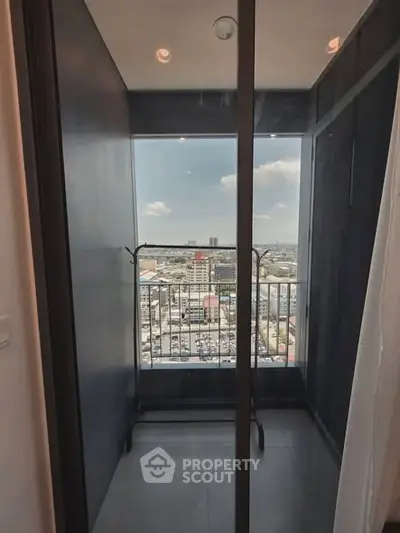 Modern balcony with stunning city view, perfect for relaxation and enjoying the skyline.