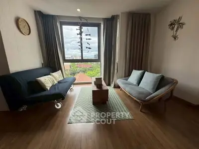 Cozy living room with stylish furniture and scenic view