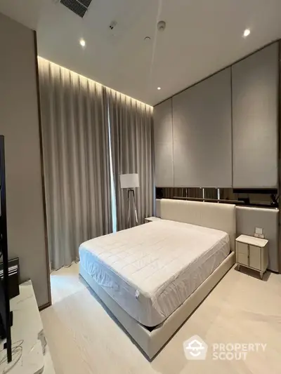 Luxurious modern bedroom with elegant decor and ambient lighting