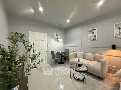 Modern living room with stylish decor and cozy seating area