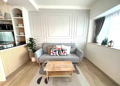 Stylish modern living room with cozy sofa and chic decor