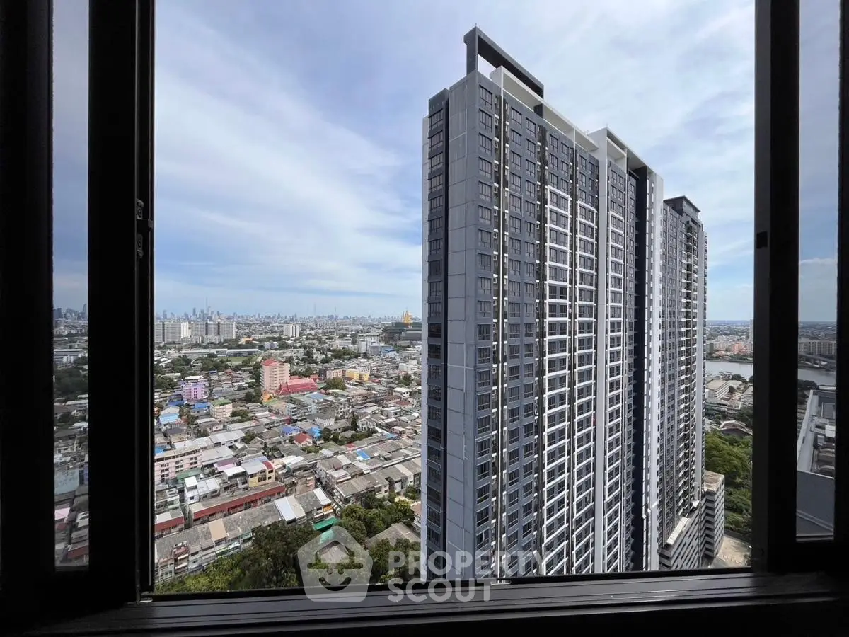Stunning high-rise building with panoramic city view from window