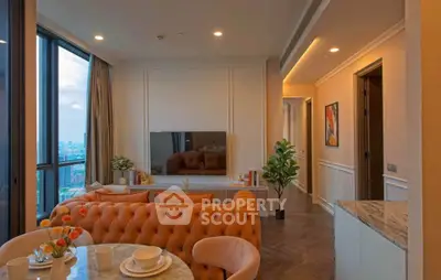 Luxurious living room with elegant decor and stunning city view, featuring plush seating and modern design.