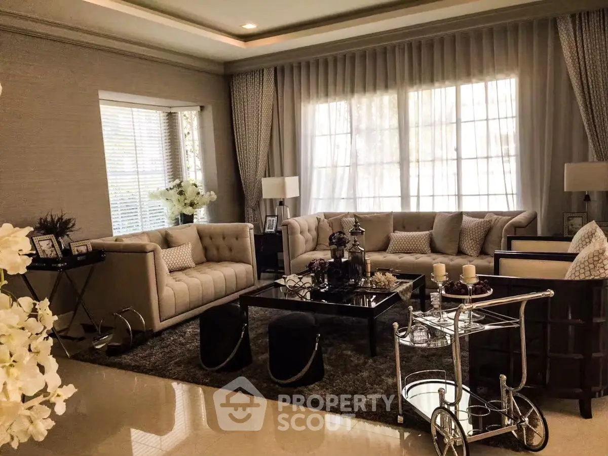Luxurious living room with elegant decor and plush seating, perfect for relaxation and entertaining.