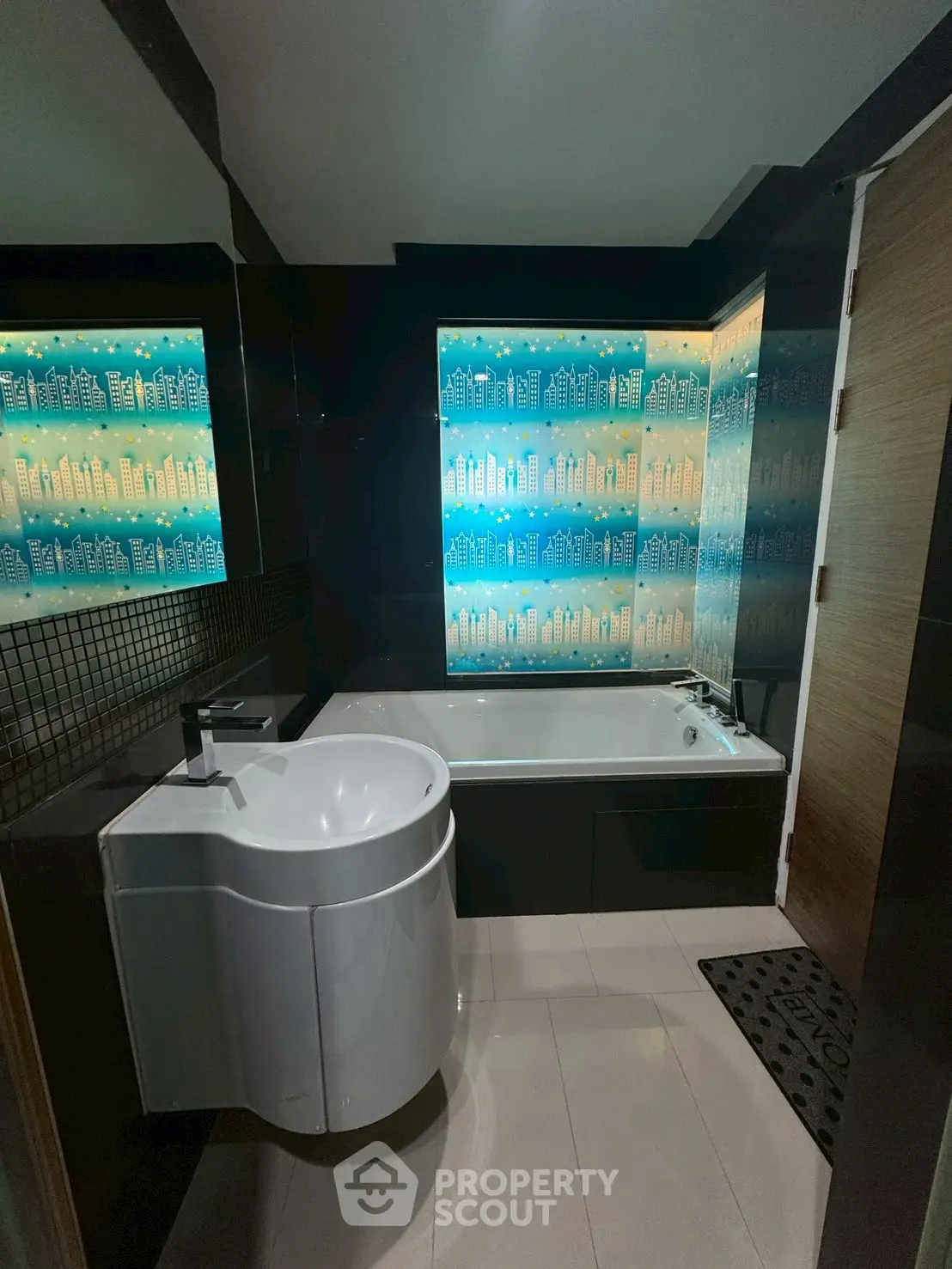 Luxurious modern bathroom with stylish bathtub and unique wall design