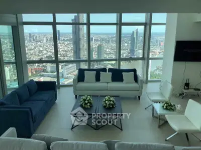 Luxurious living room with panoramic city view and modern furnishings