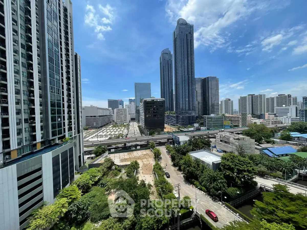 Stunning cityscape view with modern skyscrapers and lush greenery, perfect for urban living enthusiasts.