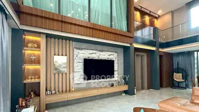 Luxurious modern living room with high ceilings and elegant decor