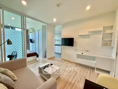 Modern open-plan living room with sleek design and natural light