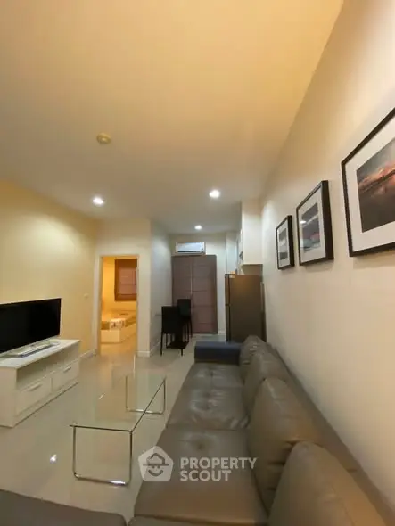 Modern living room with sleek furniture and ambient lighting