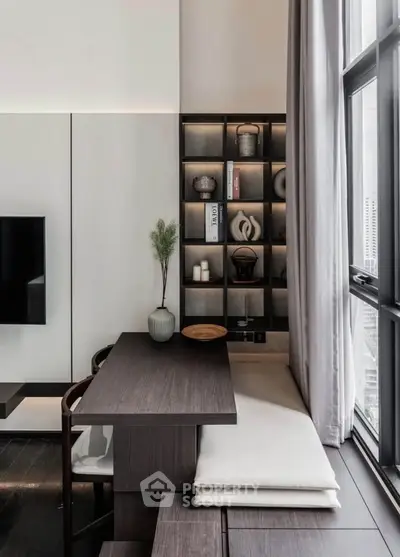 Modern living room with stylish shelving and large window view