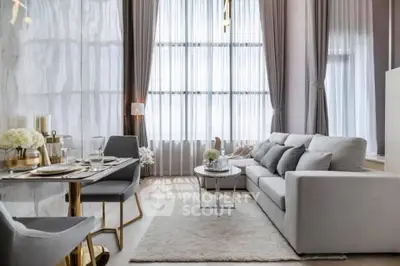 Luxurious modern living room with high ceilings, elegant curtains, and chic furniture in a sophisticated apartment.