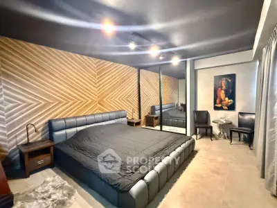 Luxurious modern bedroom with stylish wood paneling and elegant decor
