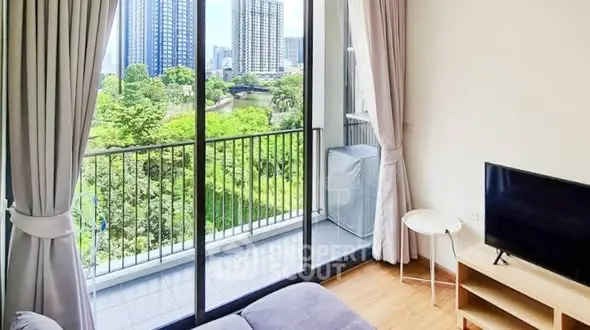 Bright living room with balcony and stunning city view, perfect for urban living.