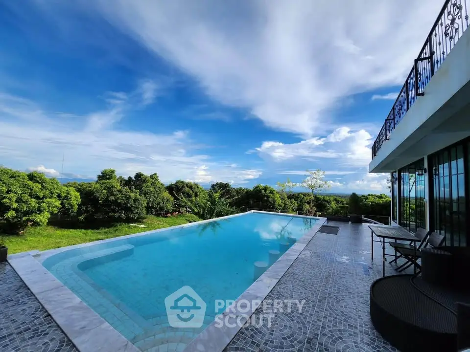 Luxurious villa with stunning pool and panoramic views, perfect for relaxation and entertaining.