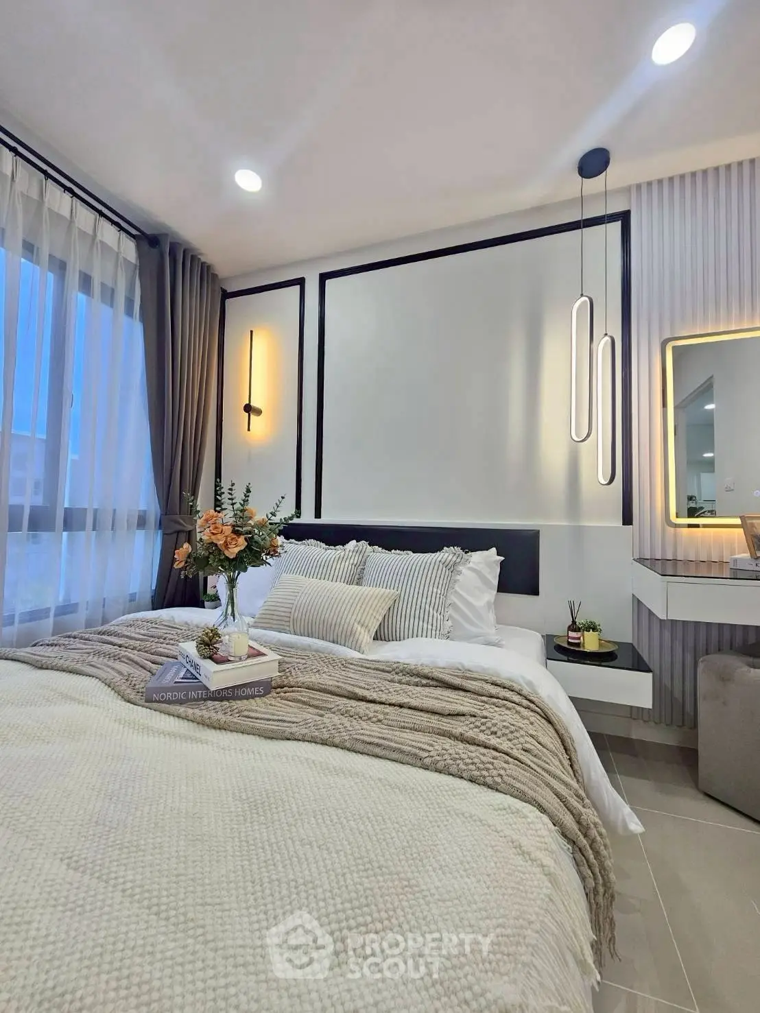 Luxurious bedroom with modern decor and elegant lighting