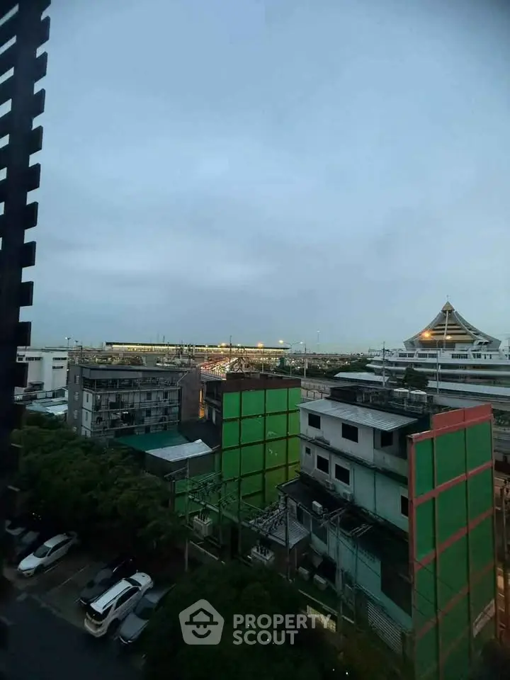 Stunning cityscape view from high-rise building, showcasing urban architecture and vibrant skyline.