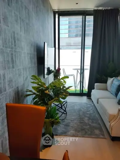 Modern living room with stylish decor and large window view