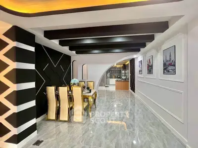 Luxurious modern dining area with elegant decor and open kitchen layout