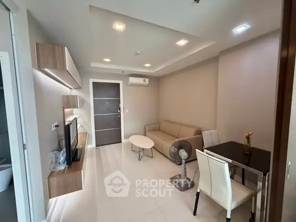 Modern living room with sleek furniture and ambient lighting