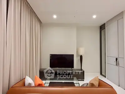 Modern living room with sleek furniture and ambient lighting