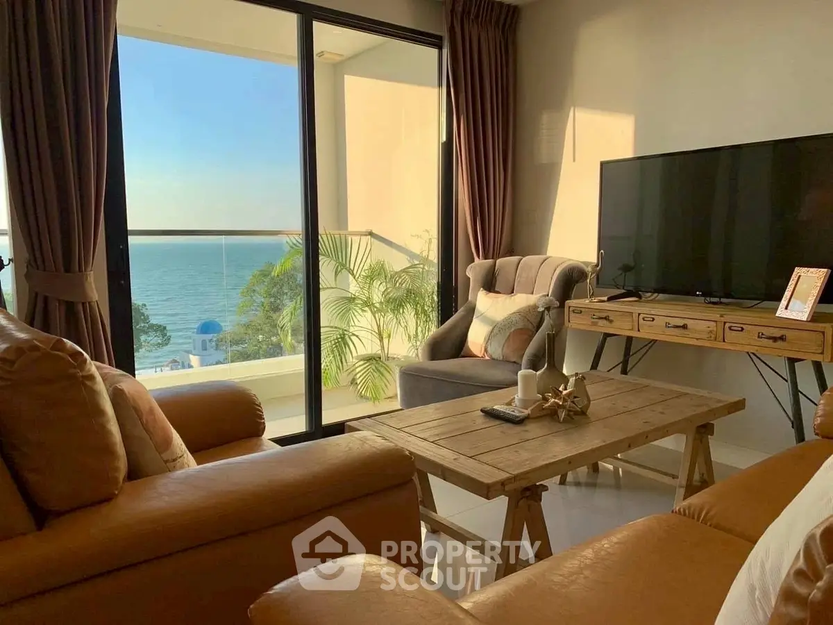 Luxurious living room with stunning ocean view and elegant decor