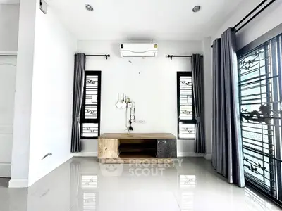 Bright living room with modern air conditioning and stylish decor