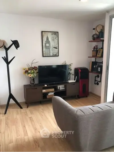 Stylish living room with modern decor and comfortable seating.