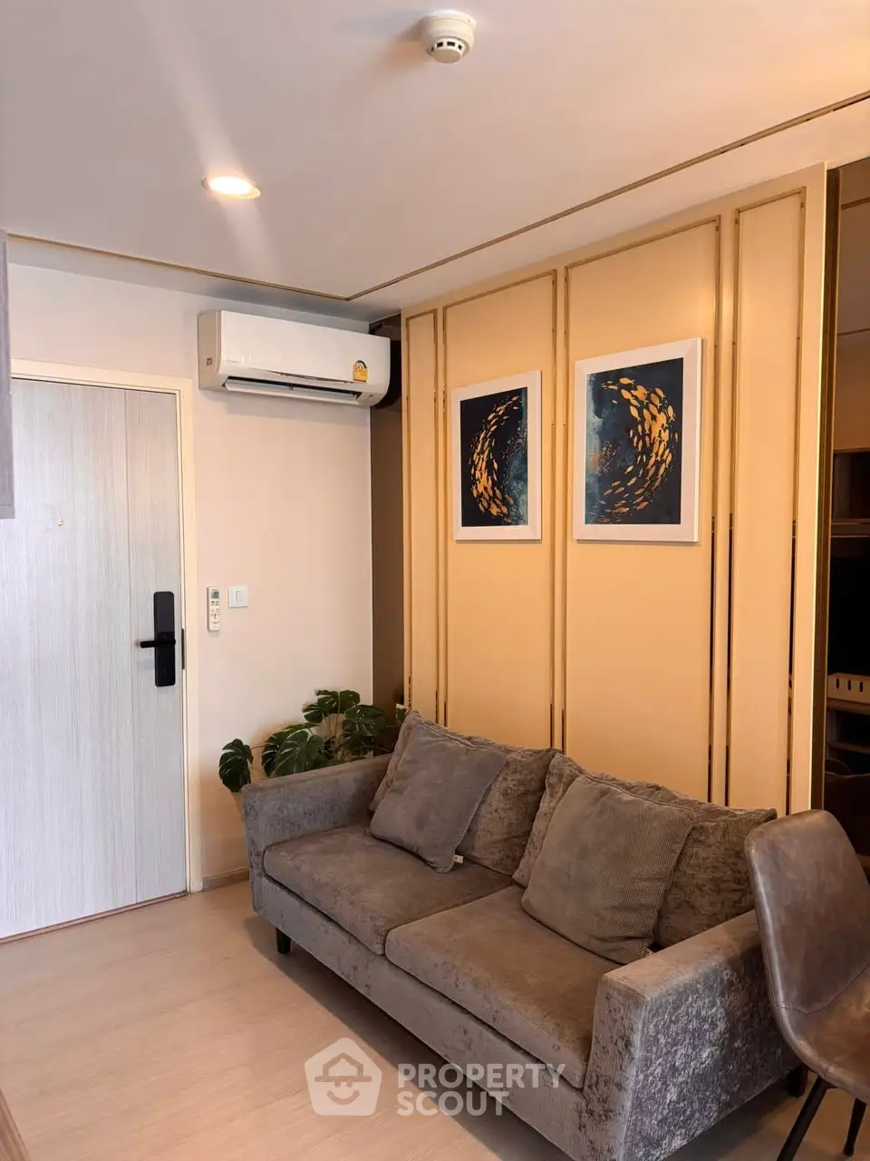 Cozy living room with modern decor and air conditioning