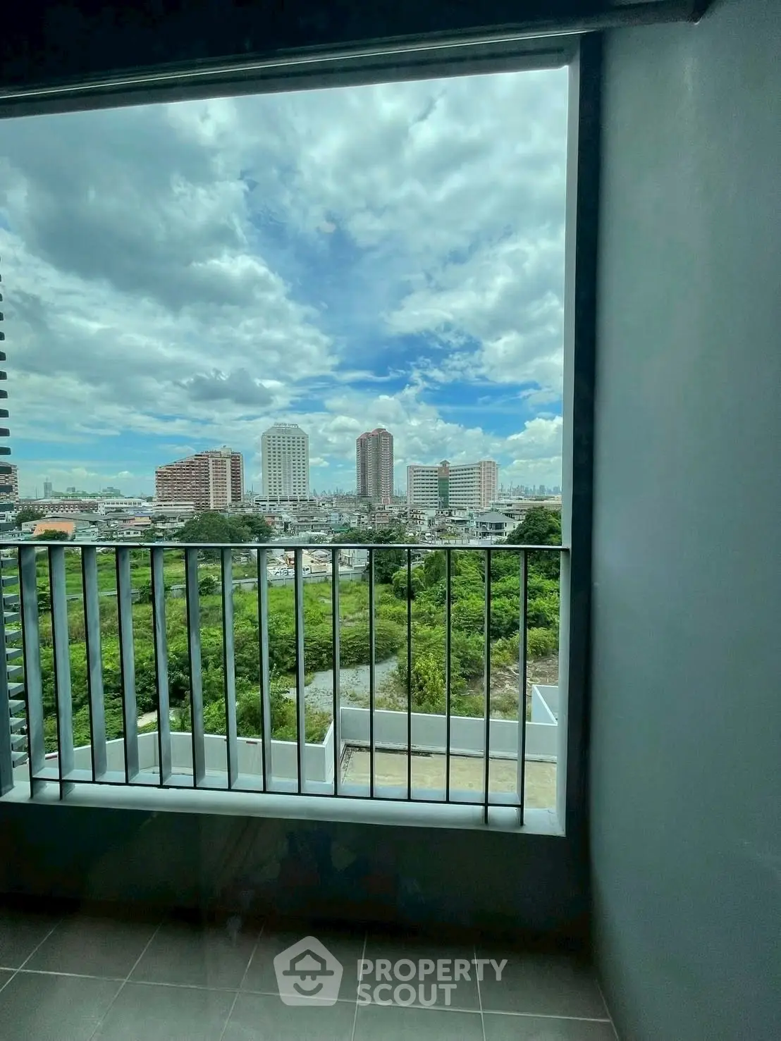 Stunning cityscape view from a modern balcony, perfect for urban living.