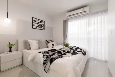 Modern bedroom with stylish decor and natural light